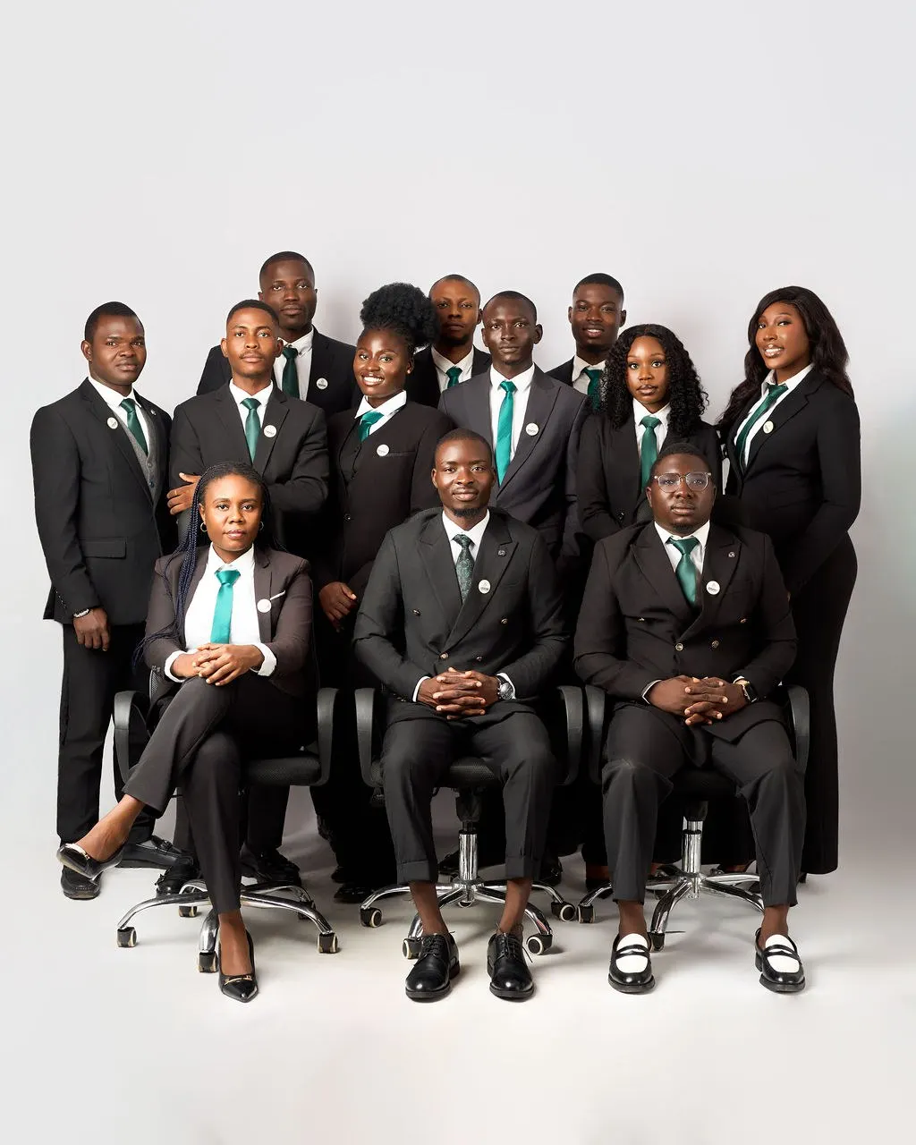 The Astracrest team seated and standing together in a studio